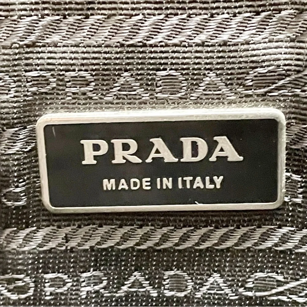 Prada black nylon and leather silver pushlock vintage iconic slouchy briefcase